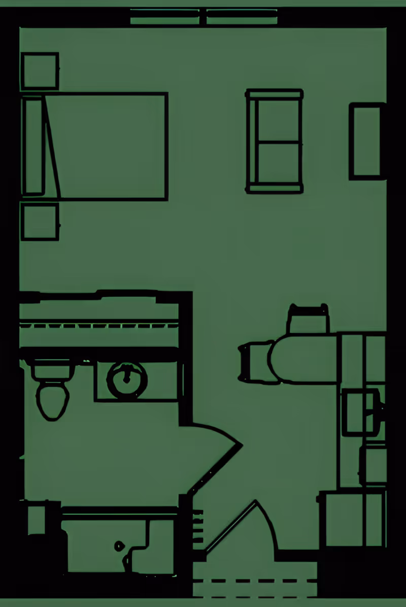 Top-down floor plan of a studio-style apartment showing a bed, bathroom with toilet and sink, kitchenette, living area furniture, and an entry door.