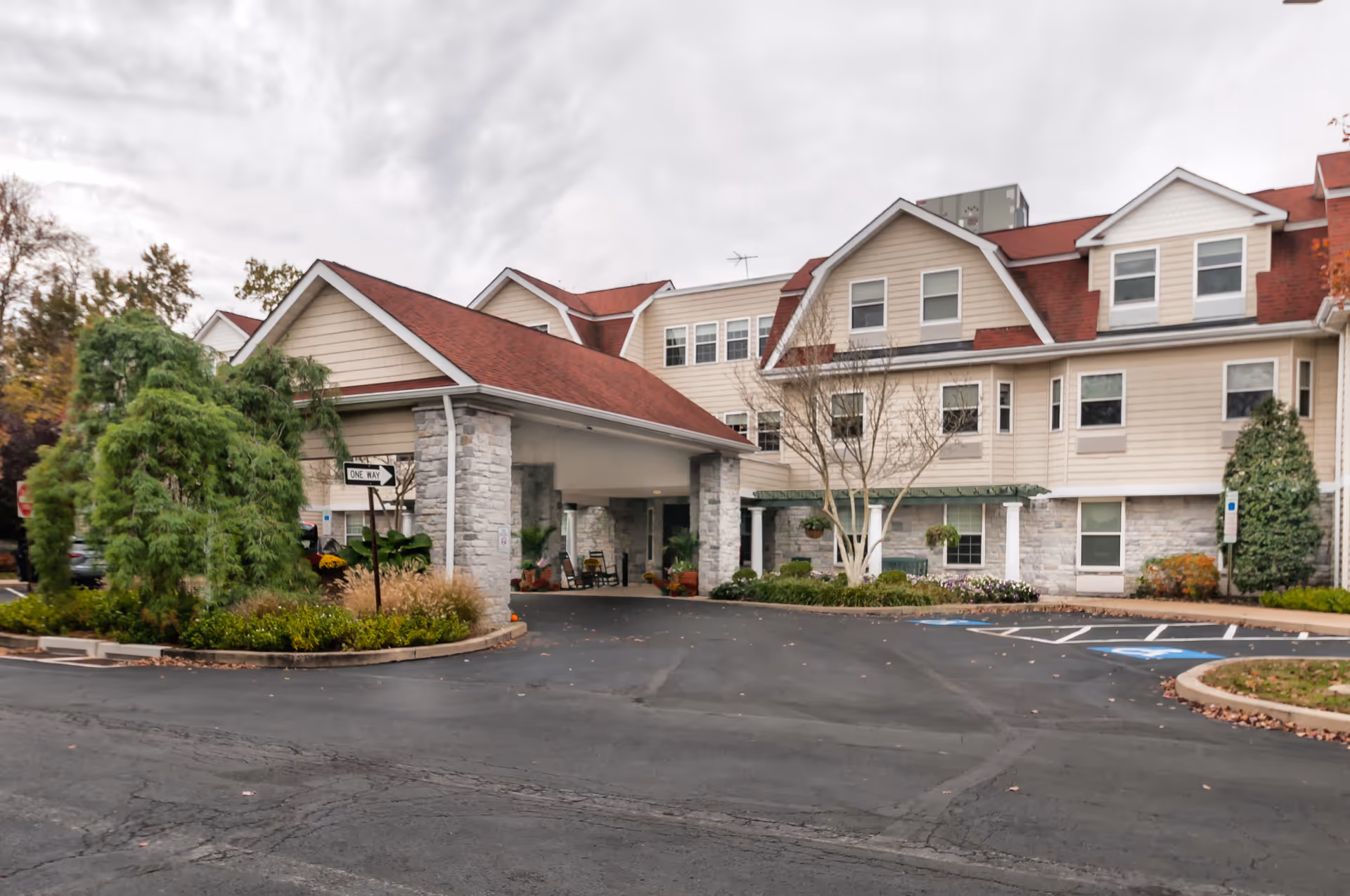 Exterior view of Brandywine Haverford Estates by Monarch, showing the entrance and landscaped front.