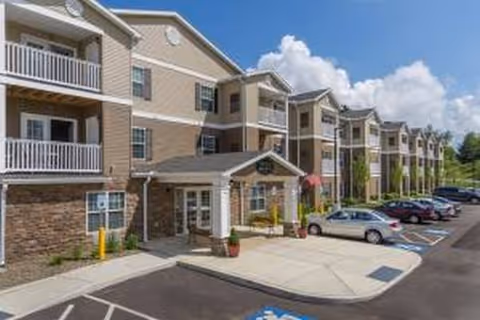 Exterior view of Bergquist Adult Home, a multi-unit senior living building with balconies.