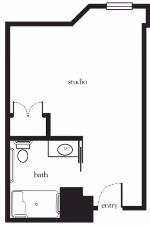 Floor plan layout of a studio apartment with an entry door leading into the main studio space. The plan includes a bathroom with a bathtub, toilet, and sink.