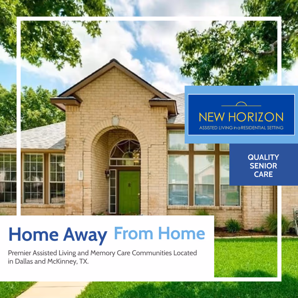 Exterior view of a brick residential building with a green front door, large windows, and a well-maintained lawn under a partly cloudy sky with trees around.