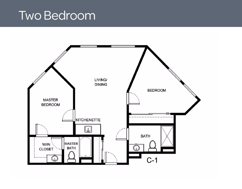 Floor plan of a two-bedroom apartment featuring a master bedroom with walk-in closet and master bath, a second bedroom, a living/dining area, a kitchenette, and a second bathroom.