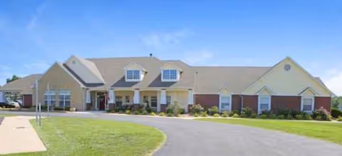 Front exterior view of Brookdale Derby senior living facility with driveway and lawn.