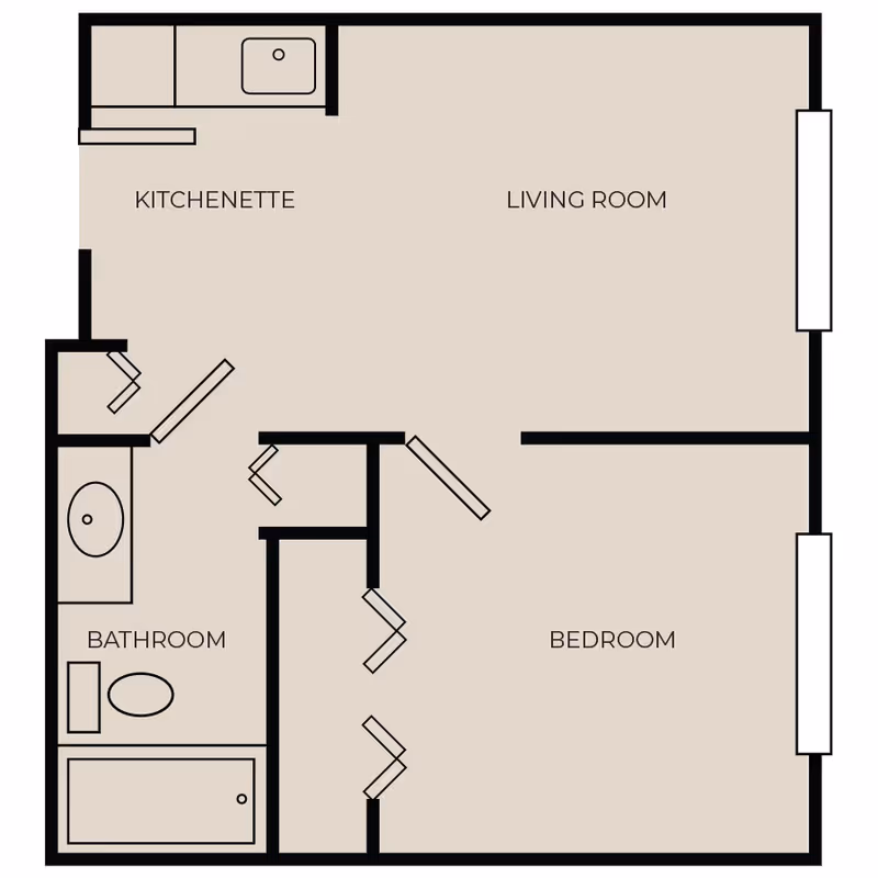 Floor plan layout of a living space at The Gables of Palm Harbor, showing a kitchenette, living room, bedroom, and bathroom with labeled areas and fixtures.