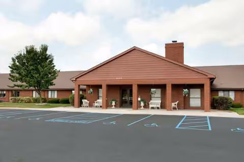 Exterior view of Life Care Center of Valparaiso entrance with parking lot