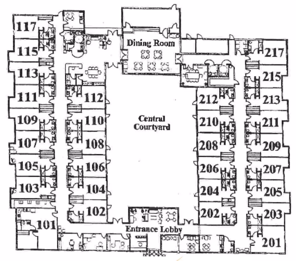 Architectural floor plan of AUS Senior Living at Bartow showing a central courtyard surrounded by rooms numbered 101 to 117 on the left side and 201 to 217 on the right side. The plan includes an entrance lobby at the bottom center and a dining room at the top center. Various smaller rooms and hallways connect the main areas.