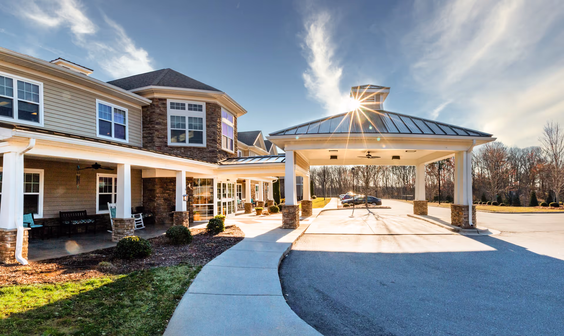 Exterior view of Arbor Ridge at Stanleyville featuring a covered entrance and driveway.