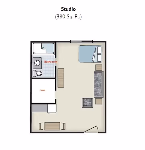 Floor plan of a studio apartment measuring 380 square feet, showing a combined living and sleeping area with a bed, sofa, coffee table, dining table with two chairs, a closet, and a bathroom with a bathtub, toilet, and sink.
