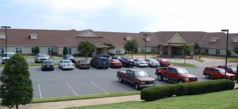 Exterior view of Brookdale Chenal Heights with a parking lot in front