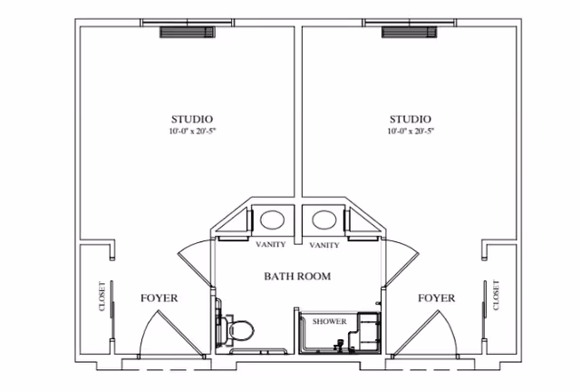 Architectural floor plan showing two studio apartments side by side, each with a foyer, closet, and a shared bathroom area in the center that includes two vanities, a shower, and a toilet.