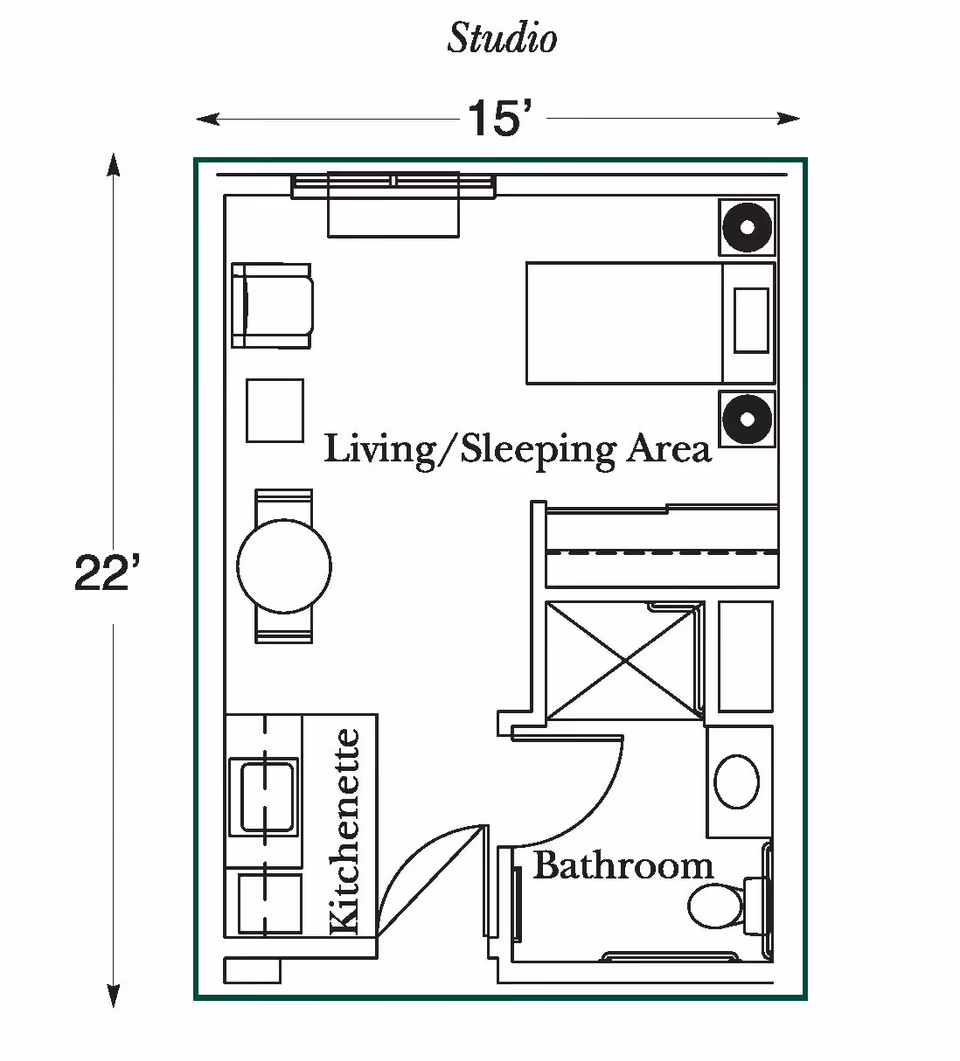 Floor plan of a studio apartment at Heritage Woods of Manteno showing a living/sleeping area with a bed, chair, table, kitchenette, and a separate bathroom.