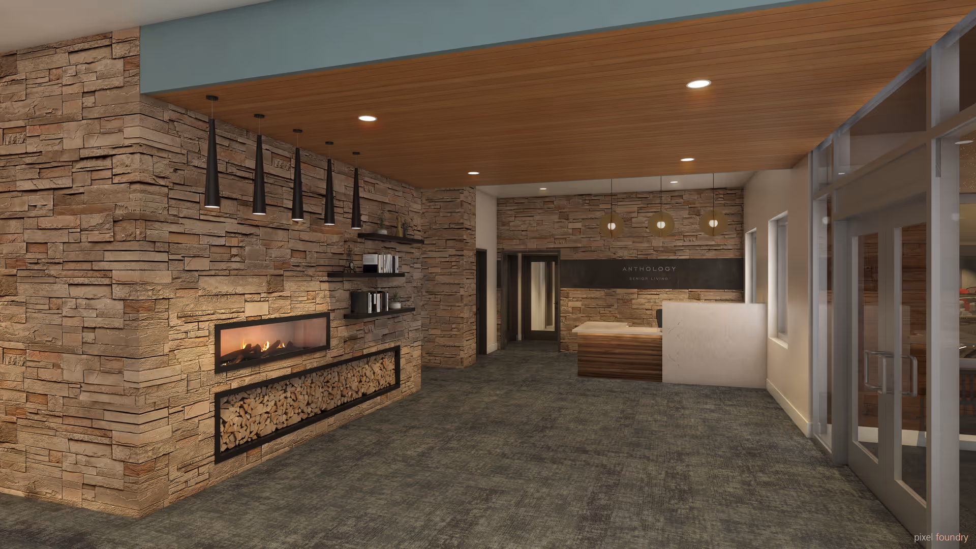 Interior view of a senior living facility lobby with stone walls, a modern fireplace with stacked firewood below, hanging pendant lights, a wooden ceiling, and a reception desk with a sign that reads 'Anthology Senior Living'.
