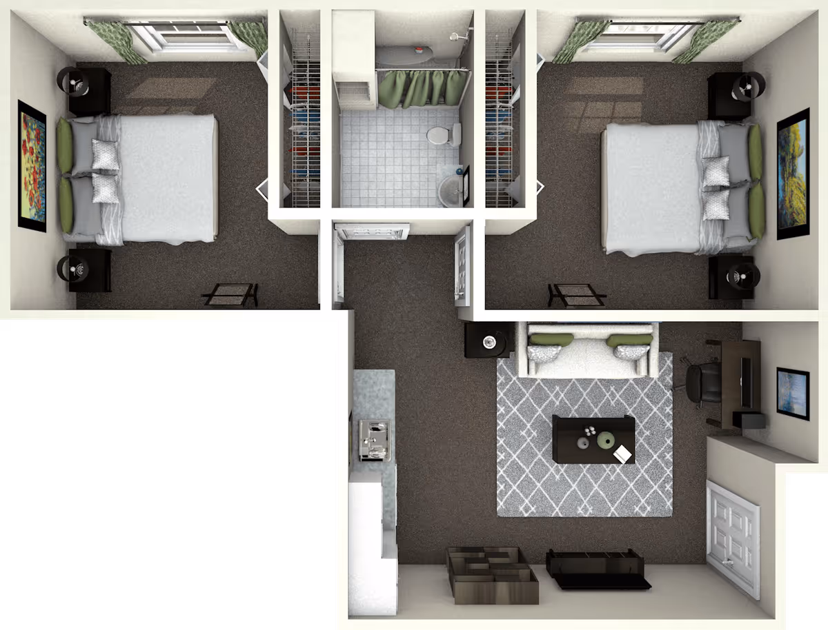 Top-down floor plan of an assisted living unit showing two bedrooms each with a bed, nightstands, lamps, and wall art. Between the bedrooms is a bathroom with a shower, toilet, and sink, flanked by two closets. The living area includes a sofa, coffee table, side table, desk with chair, and a kitchen area with a sink and counter space.