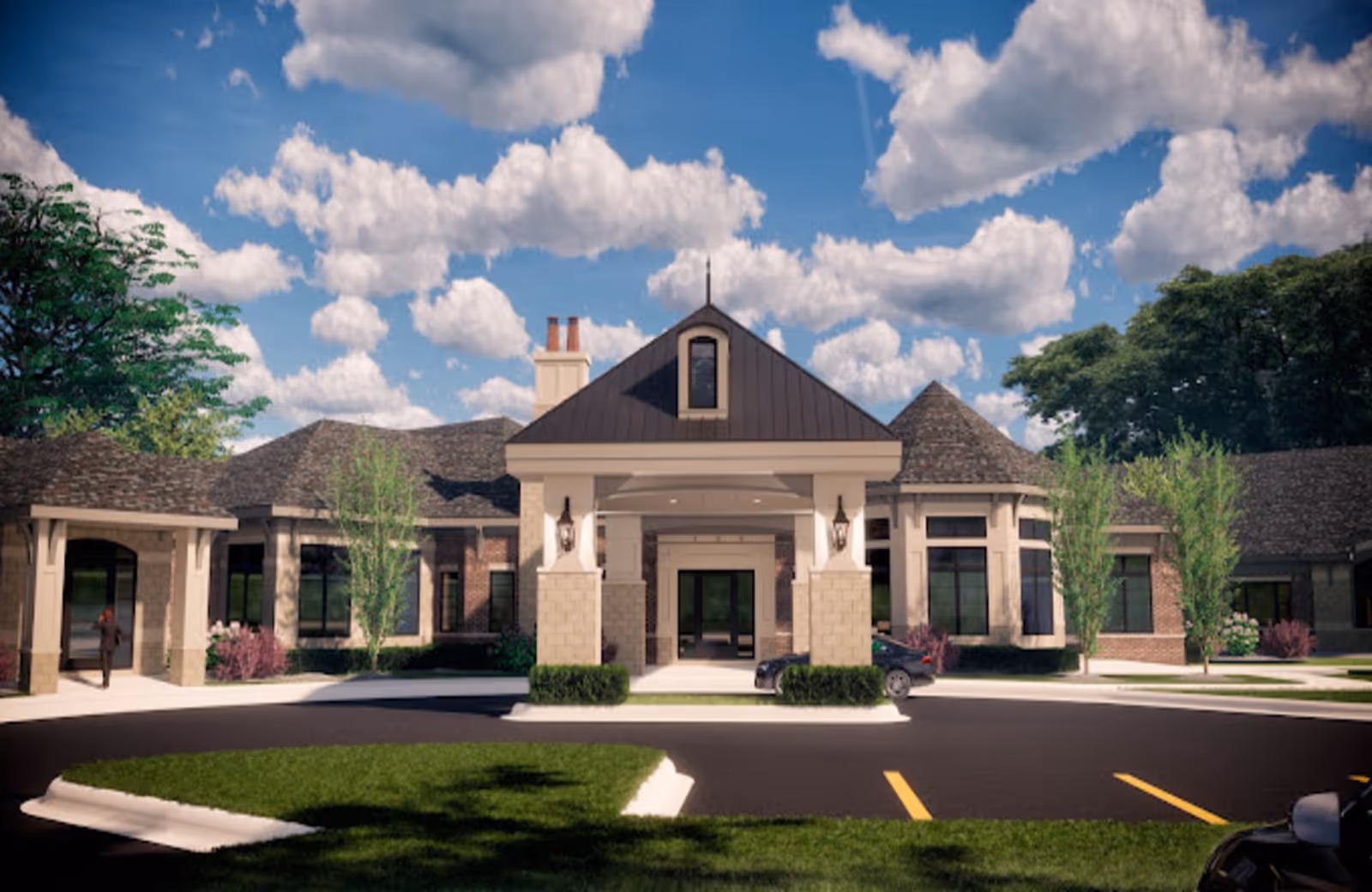Front exterior of a single-story senior living facility with a covered entrance, driveway, and landscaped grounds under a partly cloudy sky.