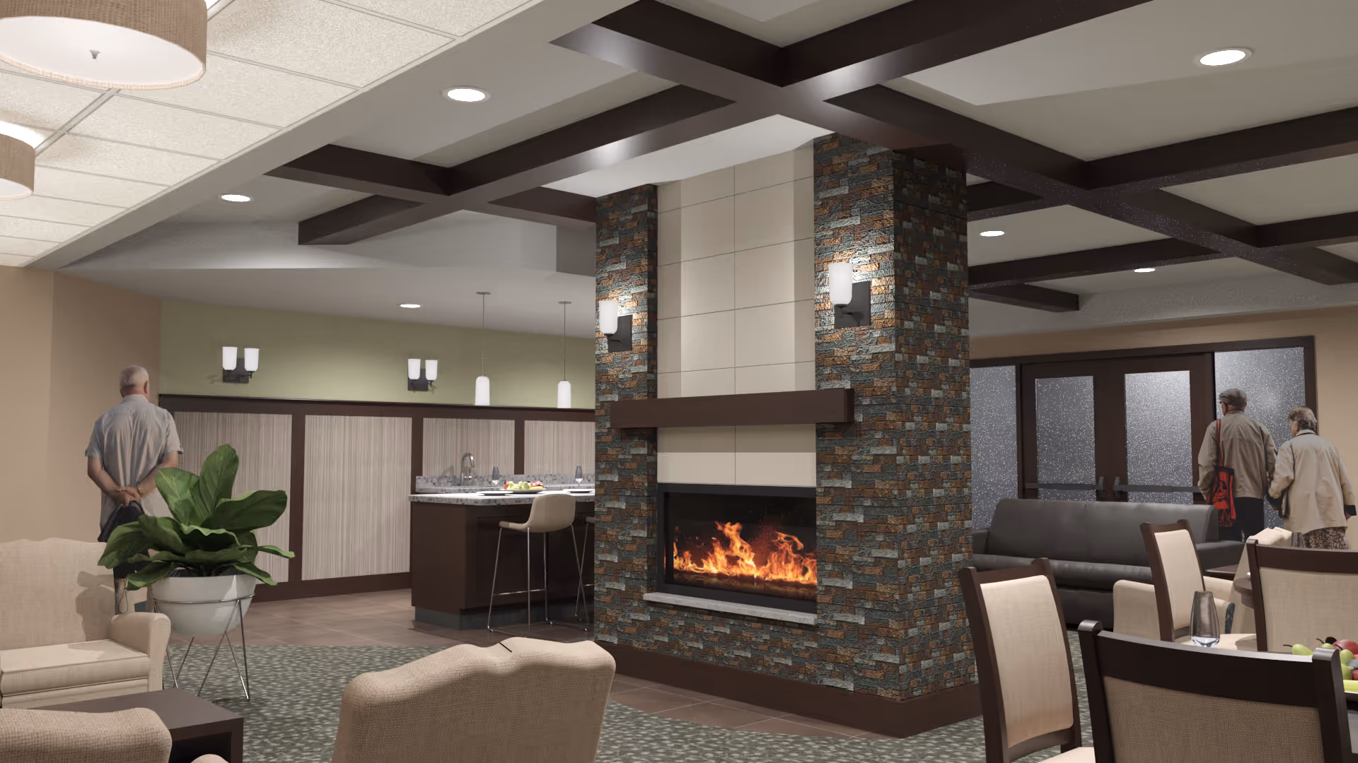 A cozy senior living facility common area featuring a modern stone fireplace with a lit fire, surrounded by comfortable seating including armchairs and sofas. In the background, there is a kitchen area with bar stools and a countertop. Three elderly people are visible, two walking toward glass doors and one standing near a plant. The ceiling has exposed dark wooden beams and recessed lighting.
