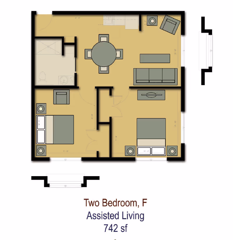 Floor plan of a two-bedroom assisted living apartment labeled 'Two Bedroom, F Assisted Living 742 sf'. The layout includes two bedrooms, a bathroom, a kitchen area, a dining area with a round table and four chairs, and a living room with a sofa, coffee table, armchair, and TV stand.