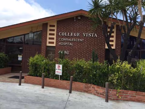 Front exterior of College Vista Convalescent Hospital with brick facade and landscaping.