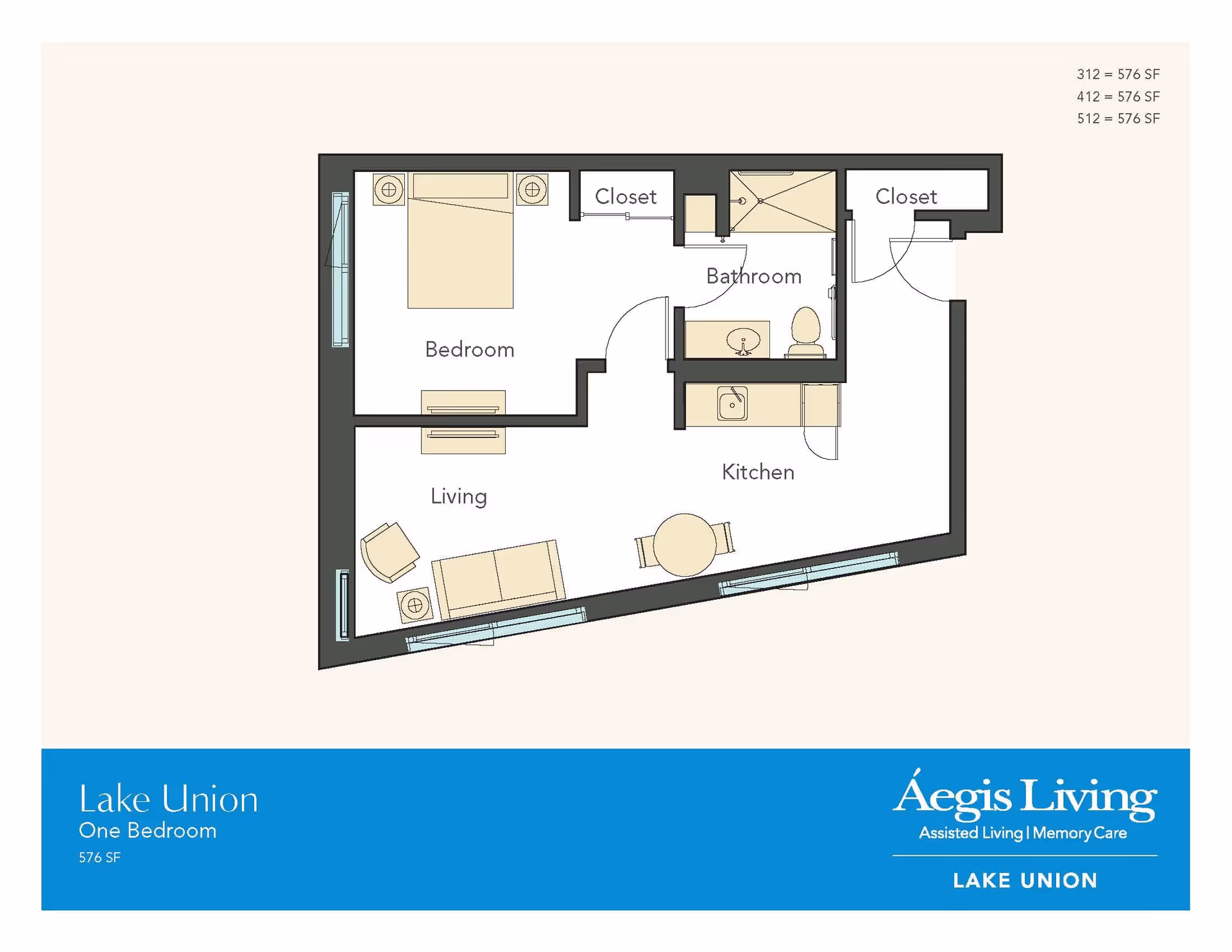 Floor plan of a one-bedroom apartment at Aegis Living Lake Union showing a bedroom, bathroom, kitchen, living area, and closets. The layout includes furniture placement such as a bed, sofa, chair, table, and kitchen fixtures.