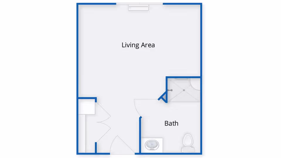 Floor plan layout showing a living area and a bathroom with a shower, sink, and toilet.