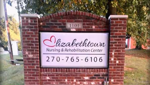 Brick sign for Elizabethtown Nursing & Rehabilitation Center with phone number.