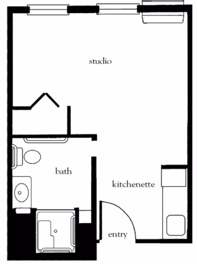 Floor plan of a studio apartment at Atria Tinton Falls showing an entry area leading to a kitchenette, a combined studio living and sleeping space, and a separate bathroom with a toilet, sink, and shower.