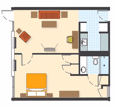 Floor plan of a senior living apartment showing a bedroom with a bed and nightstands, a living room with a sofa, armchair, coffee table, TV, and desk with a chair, and a bathroom with a sink, toilet, and shower.