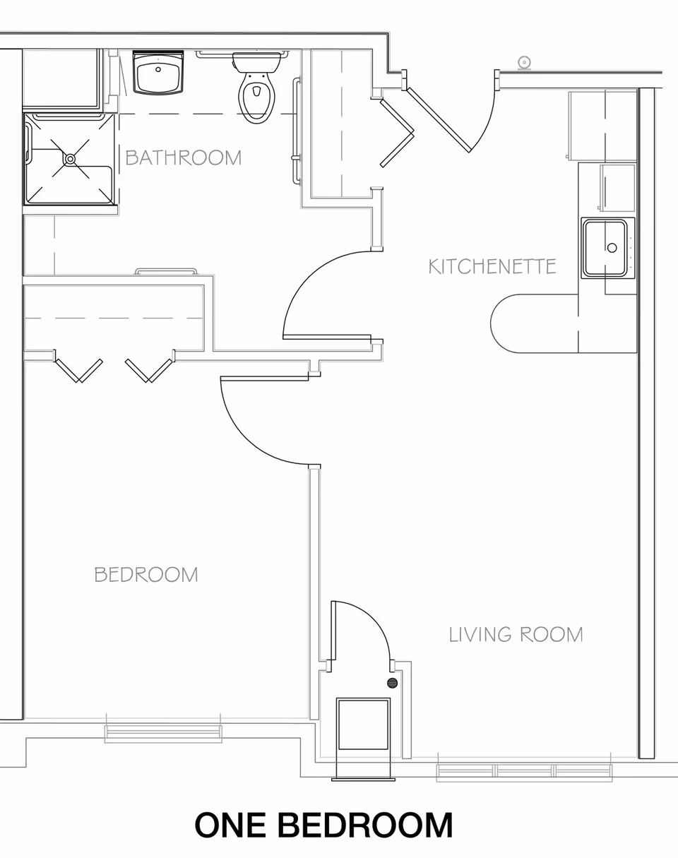 Architectural floor plan of a one-bedroom unit at Lacey Creek Supportive Living, showing a bedroom, bathroom, kitchenette, and living room with labeled areas and door placements.