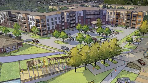 Aerial view of Watermere at Woodland Lakes, showcasing buildings, parking, and outdoor spaces.