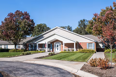 Front view of Arden Courts Livonia senior living facility entrance.