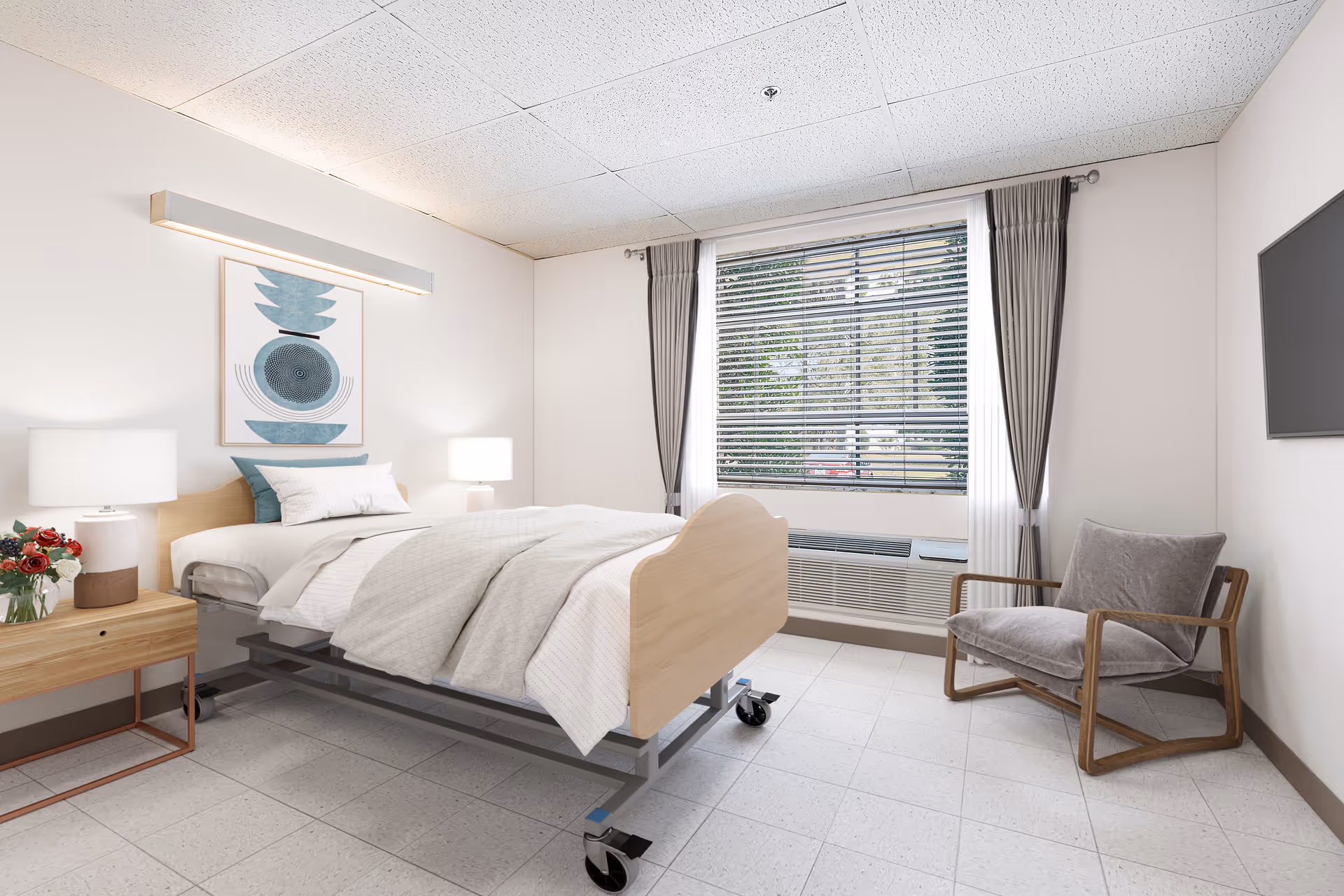 Bright senior living bedroom with a hospital-style bed, nightstands, an armchair, and a window with blinds.