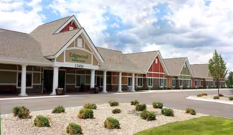 Exterior view of Edgewood Senior Living with a covered front entrance.