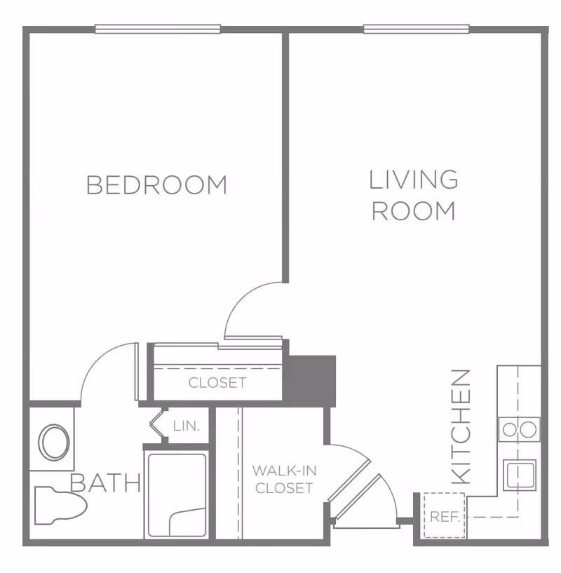 Floor plan layout of a one-bedroom apartment at Heritage Greens showing a bedroom, living room, kitchen, bathroom, closet, linen closet, and walk-in closet.