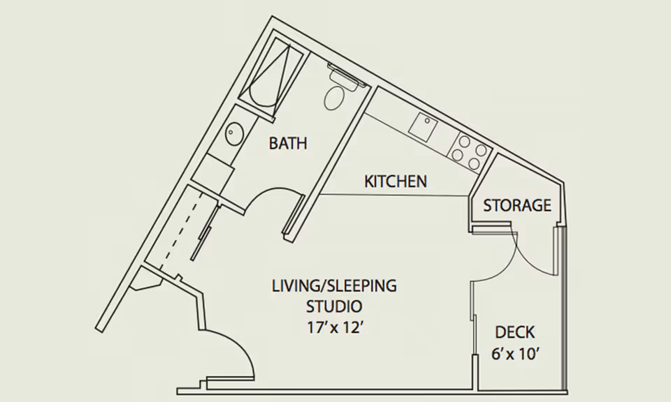 Floor plan of a studio apartment at Foothill Village Senior Living showing a living/sleeping area measuring 17 by 12 feet, a kitchen, a bathroom, a storage area, and a deck measuring 6 by 10 feet.