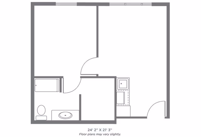 A simple black and white floor plan layout showing a small apartment with a bathroom including a bathtub, toilet, and sink, a kitchen area with a sink and stove, and two additional rooms. The dimensions are 24 feet 2 inches by 21 feet 3 inches.