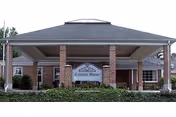 Brick nursing home entrance with a covered front entry and Yorkview Nursing and Rehabilitation sign.