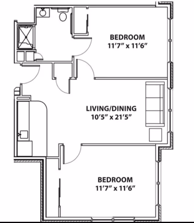Architectural floor plan of a living space at Vitality Living Franklin showing two bedrooms each measuring 11 feet 7 inches by 11 feet 6 inches, a combined living and dining area measuring 10 feet 5 inches by 21 feet 5 inches, a bathroom with a shower, toilet, and sink, and a kitchen area.