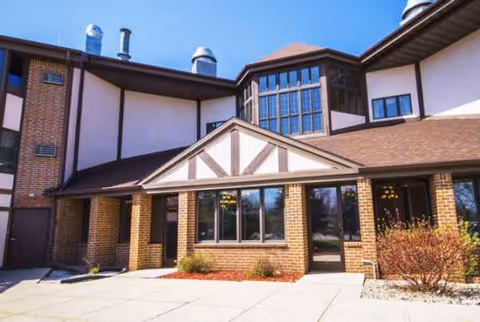 Exterior view of LakeHouse Sheboygan senior living facility entrance and facade.