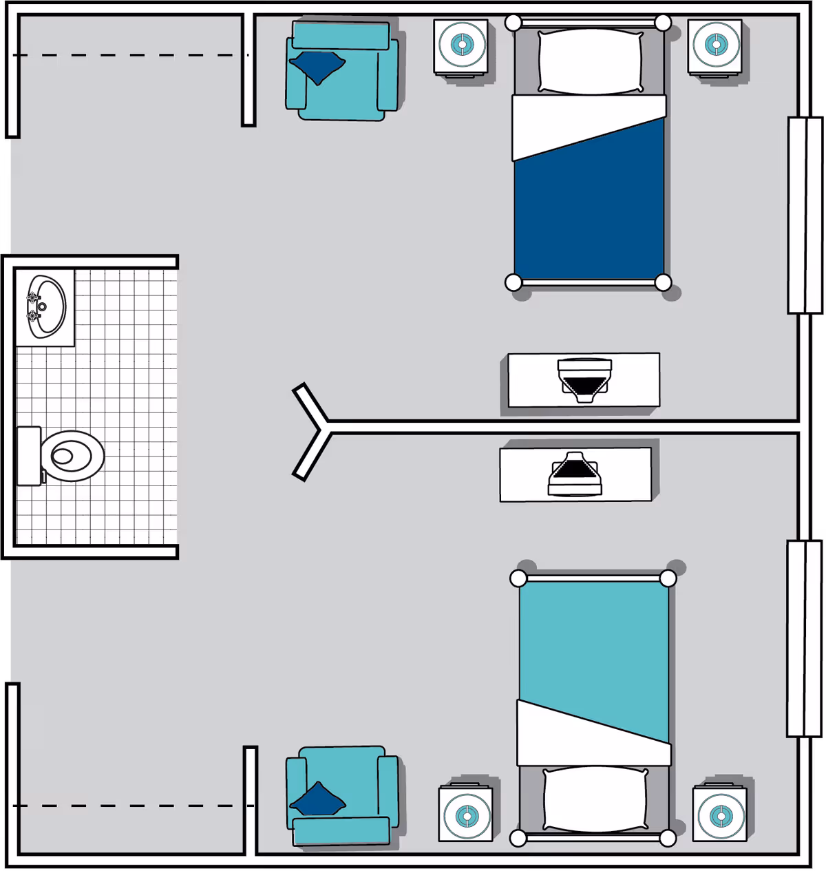 Floor plan of a living space with two beds, two armchairs, two nightstands, two dressers, and a bathroom with a toilet and sink.