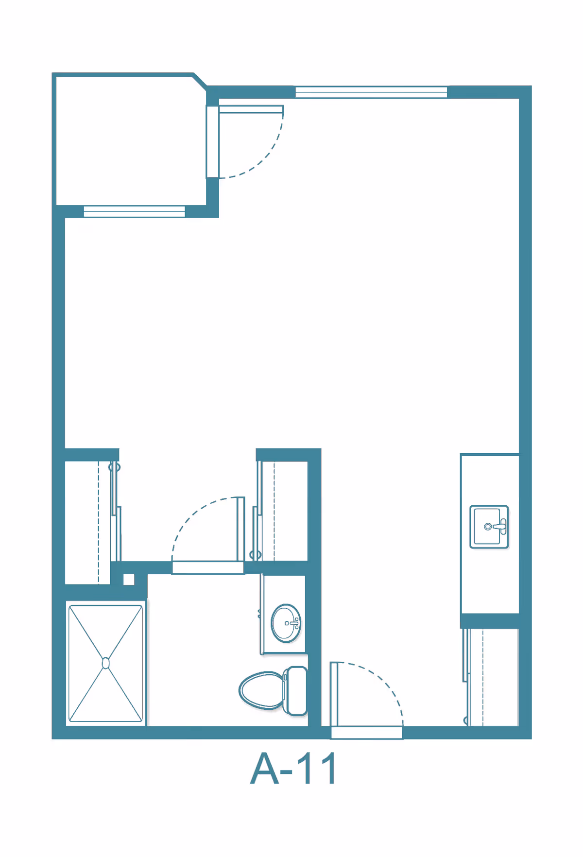 Architectural floor plan labeled A-11 showing a studio layout with a bathroom including a shower, toilet, and sink, a kitchenette area with a sink, and an open living space.