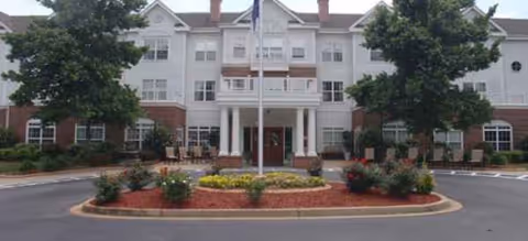 Front view of Brookdale Anderson senior living building with circular driveway.