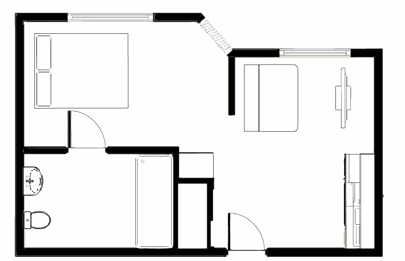 Black-and-white floor plan of a one-bedroom apartment showing a bedroom, bathroom, living area, and kitchenette.