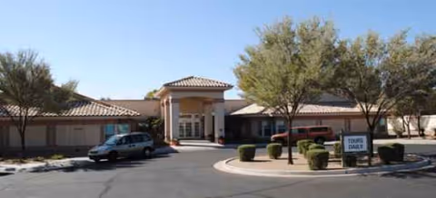 Exterior of Brookdale North Glendale senior living facility with a circular driveway and entrance.