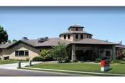 Exterior view of Avalon Care Center Bountiful showing a low, multi-section building with a lawn
