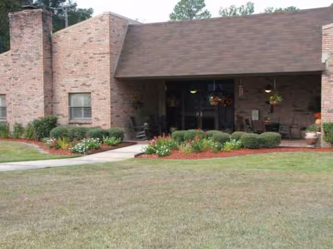 Exterior brick building of Tioga Community Care Center with landscaped entrance