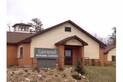 Front view of Eastwood Nursing Center building with exterior sign.