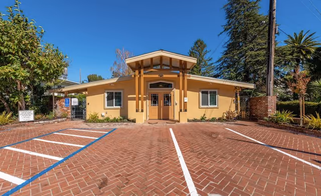 Front view of Marin Terrace Assisted Living exterior with a brick driveway.
