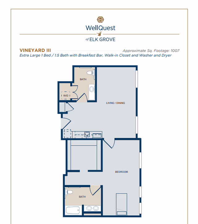 Floor plan of Vineyard III at WellQuest of Elk Grove showing an extra large 1 bedroom, 1.5 bath layout with a breakfast bar, walk-in closet, and washer and dryer. The plan includes a living/dining area, kitchen, bedroom, two bathrooms, and a washer/dryer closet.