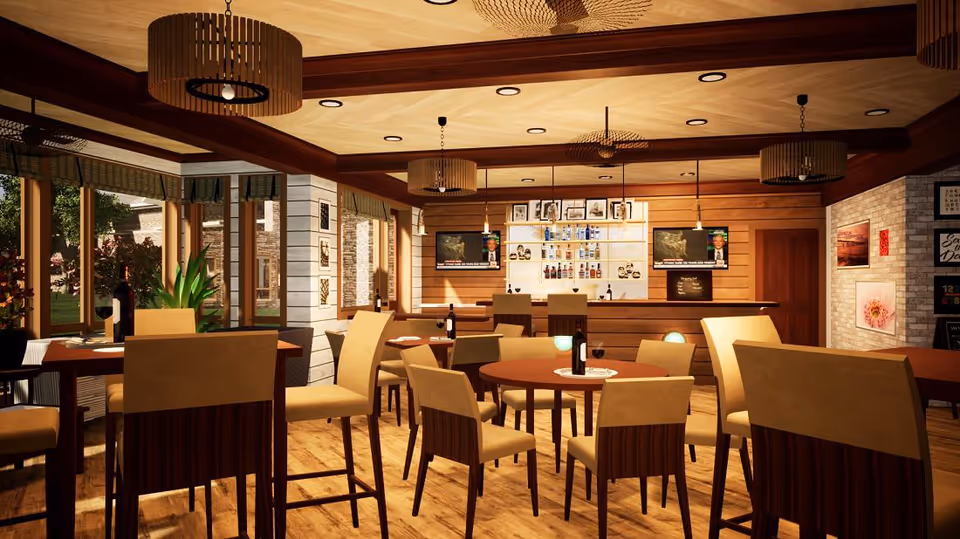 Well-lit dining/lounge area with round tables, chairs, pendant lights, and a bar in the background.