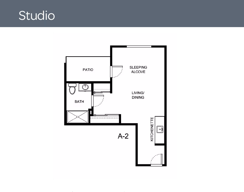 Black-and-white studio floor plan labeled A-2 showing a kitchenette, living/dining area, sleeping alcove, bath, and patio.