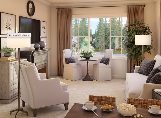 A cozy living room with beige walls and carpet, featuring a large window with brown curtains overlooking a green outdoor area with trees. The room includes a white sofa with dark plaid pillows, two beige armchairs, a small round table with two chairs near the window, a floor lamp, a side table with decorative items, and a coffee table with cups, croissants, and popcorn.